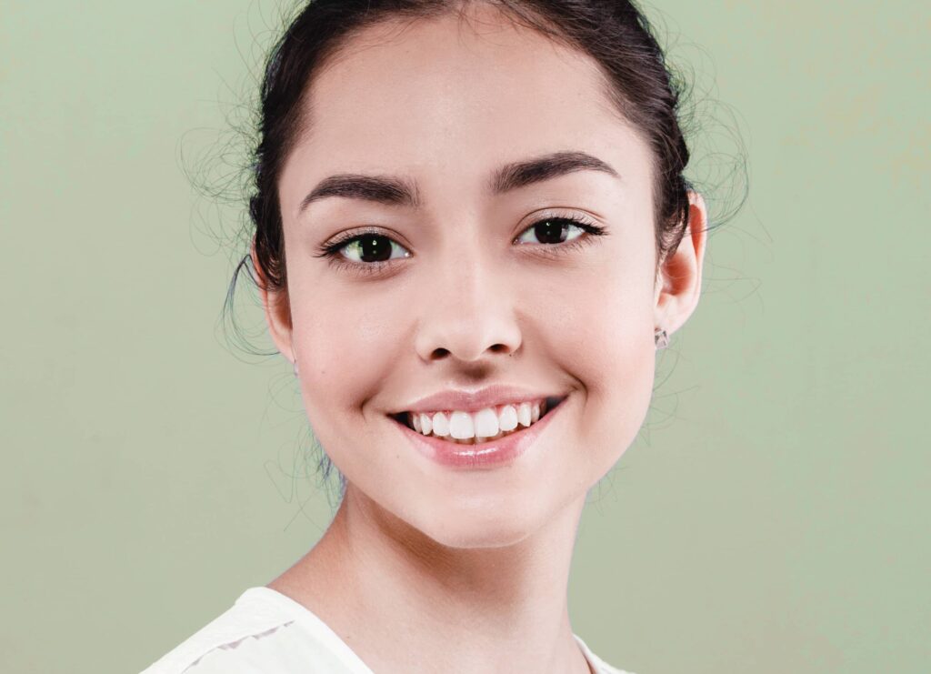 Portrait. Beautiful Spa model Girl with Perfect Fresh Clean Skin